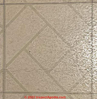 Tan brick floor tiles (C) InspectApedia.com Kate